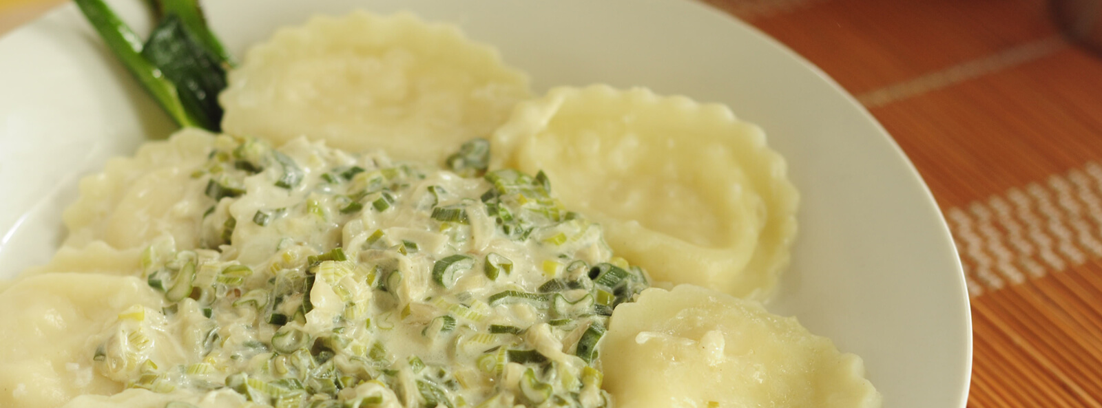 Sorrentinos con Salsa de Verdeo